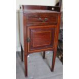 An Edwardian mahogany and inlaid bedside cupboard