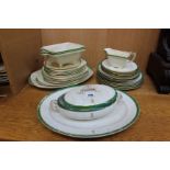Minton for Apsley Pellat & Co, green and gilt rim plates with a gilt heraldic symbol (15 pieces),