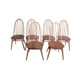 A set of six Ercol elm dining chairs