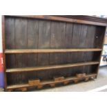 An oak dresser rack 127cm high, 197cm wide