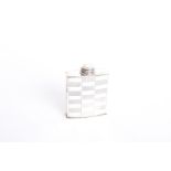 A silver powder flask, A Wilcox, Birmingham, 1932, with geometric engine turned detail, 10cm high,