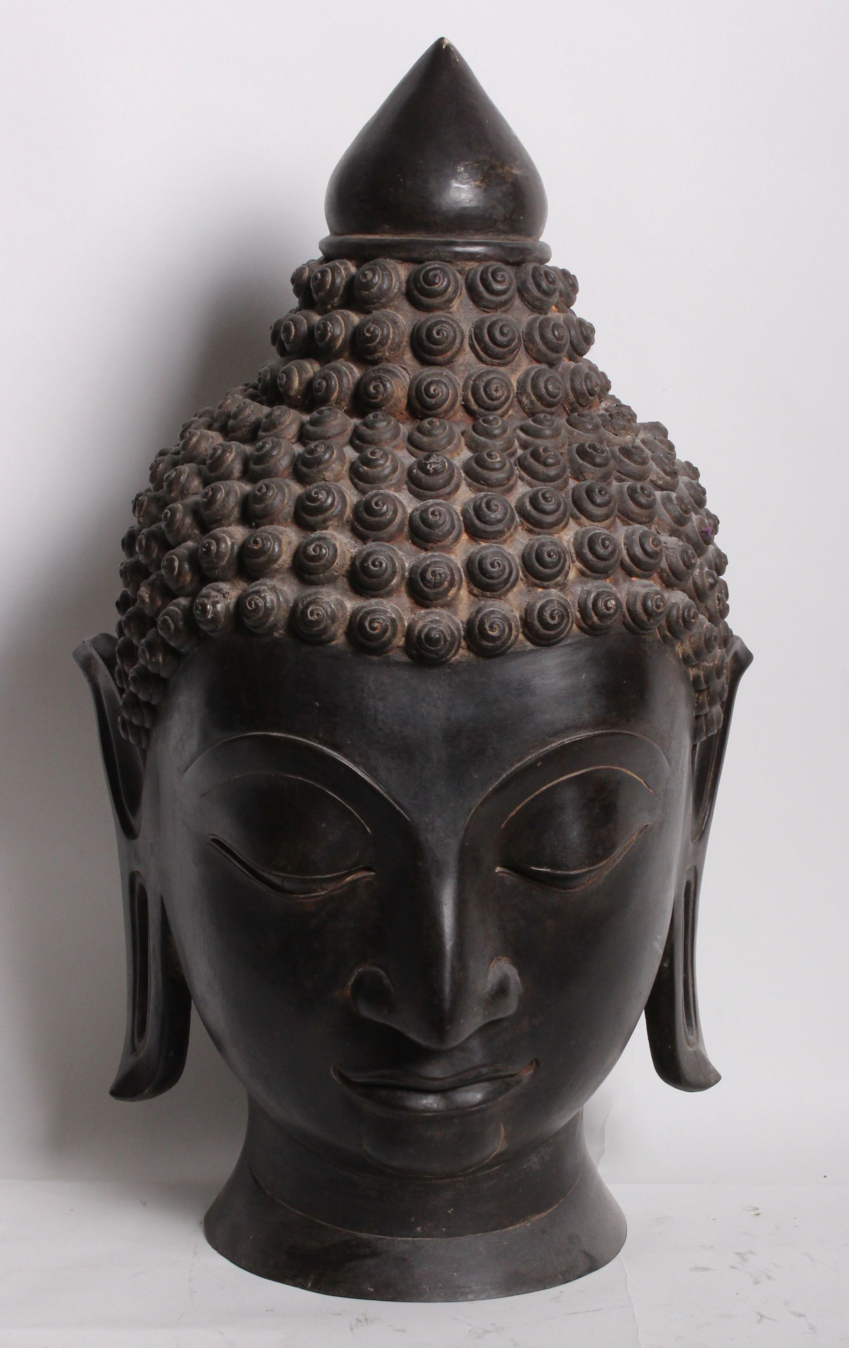Two bronze heads of meditating Buddhas with elongated earlobes and tightly curled hair 80cm high - Image 2 of 2
