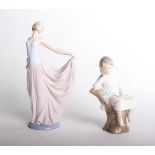 Two Lladro porcelain figures of Dancer 5050 33cm high and a boy reading on a tree stump 4876 (2)