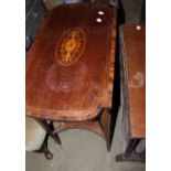A Victorian mahogany sutherland table and an Edwardian mahogany and inlaid two tier table