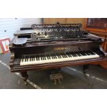 A Bechstein grand piano in a rosewood case with turned octagonal legs