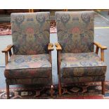 Two oak upholstered armchairs.