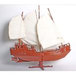 A Vietnamese model boat on stand 100cm length