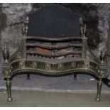 A George III style fire grate with serpentine front 63cm high, 76cm wide