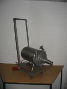Kolding 5111 portable hygienic stainless steel pump on a mobile trolley. 1" inlet and outlet. All