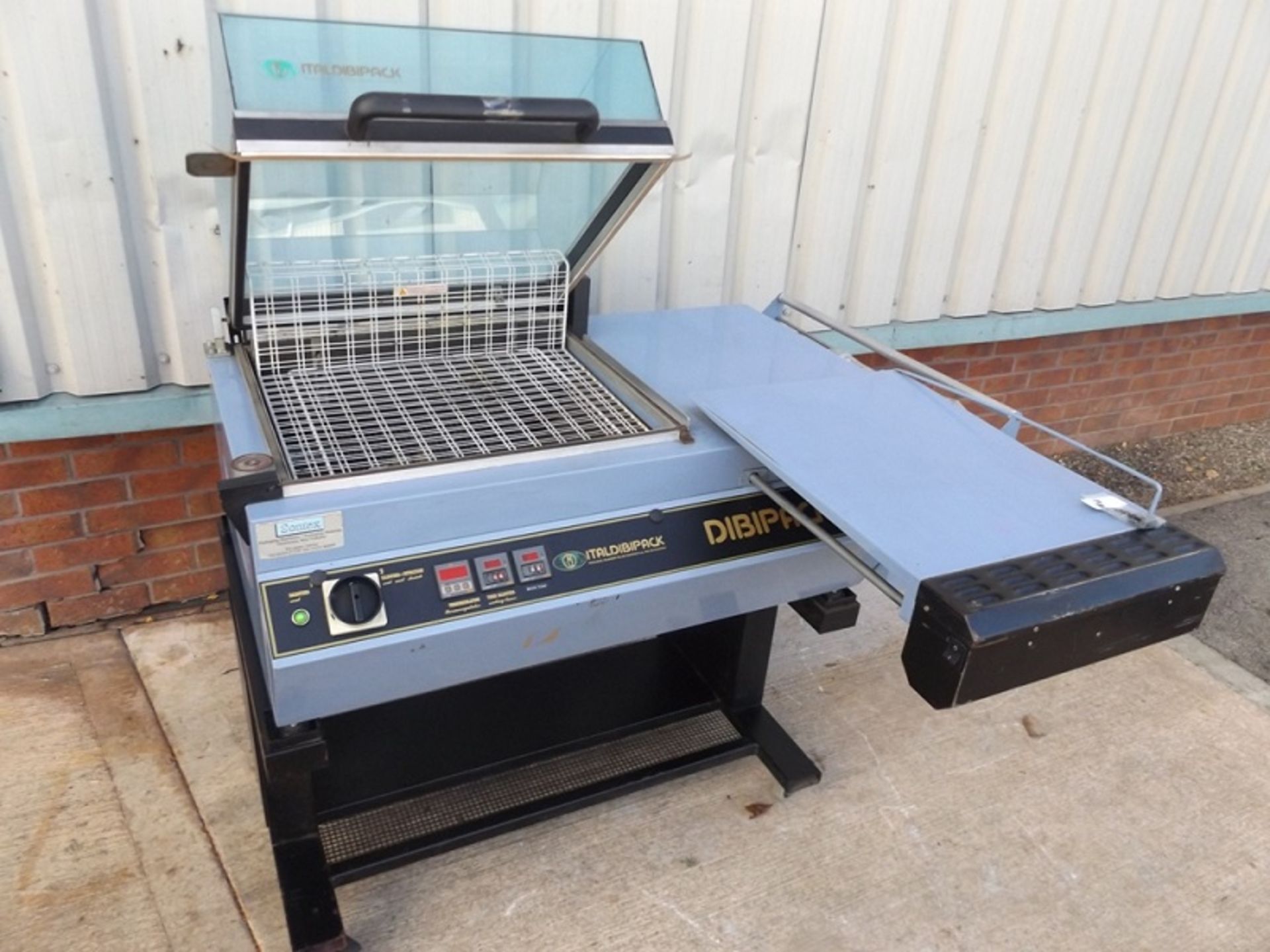 Italdibipack 4225 Heated impulse L sealer blade. Adjustable packing table to accommodate different