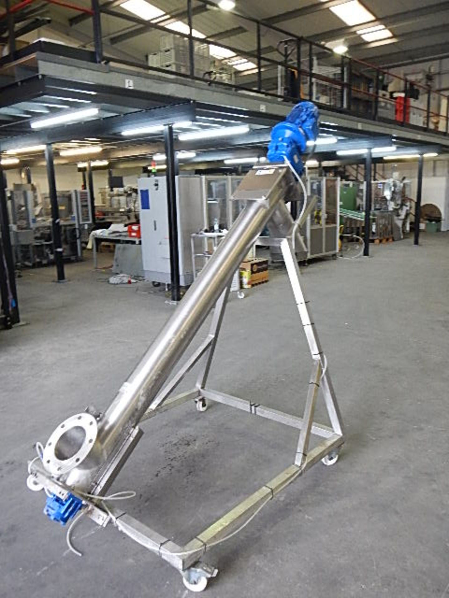 WAM TX screw elevator for powders. All stainless steel contact parts. Mounted on a robust