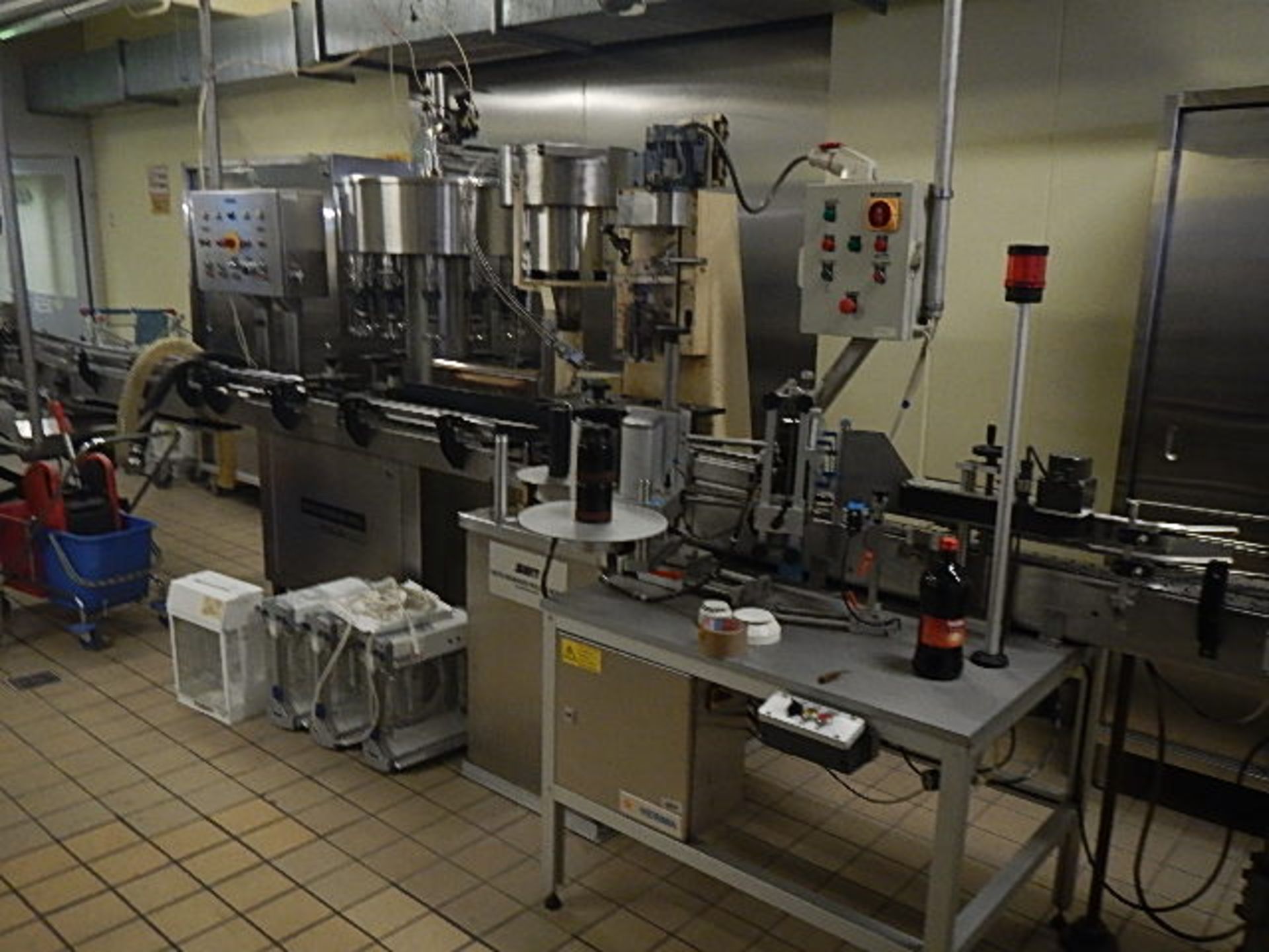 Complete Seitz filling line for 650ml and 1,000ml glass bottles. In full working condition, last - Image 18 of 40