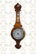 Carved oak framed Edwardian aneroid barometer