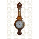 Carved oak framed Edwardian aneroid barometer