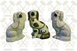 A pair of Staffordshire Wally Dogs, plus a single Wally Dog 9 inches high