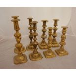 4 Pairs of brass candle sticks