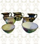 4 pieces of Sunderland lustre ware and 3 copper lustre ware jugs
