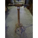A 19th century pine 5 legged dolly or postick