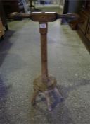 A 19th century pine 5 legged dolly or postick