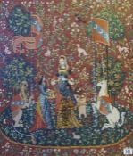 A gilt framed heraldic wool-work tapestry