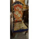 A Victorian walnut prayer chair with carved in wool work tapestry