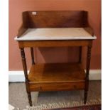 Washstand with turned columns and single drawer to base and mahogany splash back