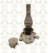 Victorian porcelain oil lamp font with Lily decoration and a matching vase.
