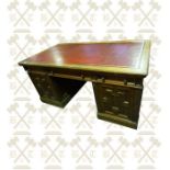 Edwardian mahogany knee hole pedestal desk with leather insert