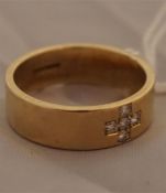 9ct gold ring set with 5 diamonds in the shape of a cross
