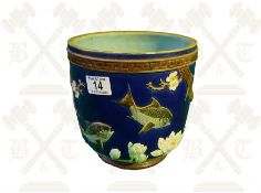 A Majolica Jardinere with raised floral fish decoration impressed to base holdcroft