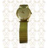 A gents 18 ct gold Karm wrist watch with a fixo-flex type watch strap