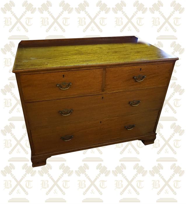 An Edwardian mahogany 4 drawer chest with brass pulls
