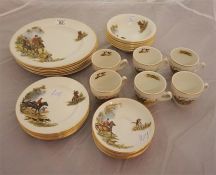 Half tea set decorated with hunting scenes comprising 6 x cups, 6 x plated, 6 x saucers and 6 sweet