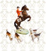 Beswick Huntsman on a rearing horse with 4 hounds (1 x repaired)