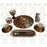 A collection of 18 pieces of crown derby, cigar pattern dining ware which includes dinner plates, te