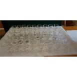 A collection of 45 assorted drinking glasses, crystal and cut glass.