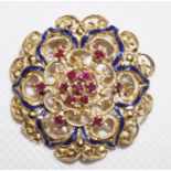 An unmarked gold Victorian pierced decorated round