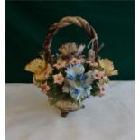A large Capo-Di-Monte basket of flowers 12" x 11"