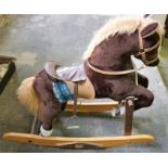 Plush stuffed rocking horse on wooden rockers