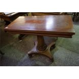 Victorian mahogany turn over top tea table on single column with platform base