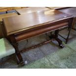 Victorian mahogany side table with single drawer standing on turned columns with turned stretcher