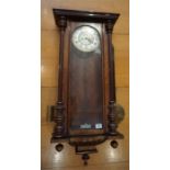 A late 19th century walnut cased Vienna regulator wall clock with 8 day movement