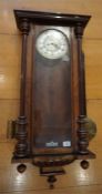 A late 19th century walnut cased Vienna regulator wall clock with 8 day movement