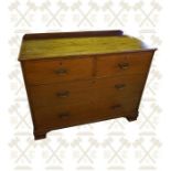 An Edwardian mahogany 4 drawer chest with brass pulls