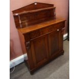 A Victorian 2 door mahogany Chifonier r with classic pediment back complete with single shelf