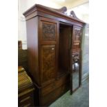 Late Victorian walnut wardrobe with central mirrored door and 4 drawers to base