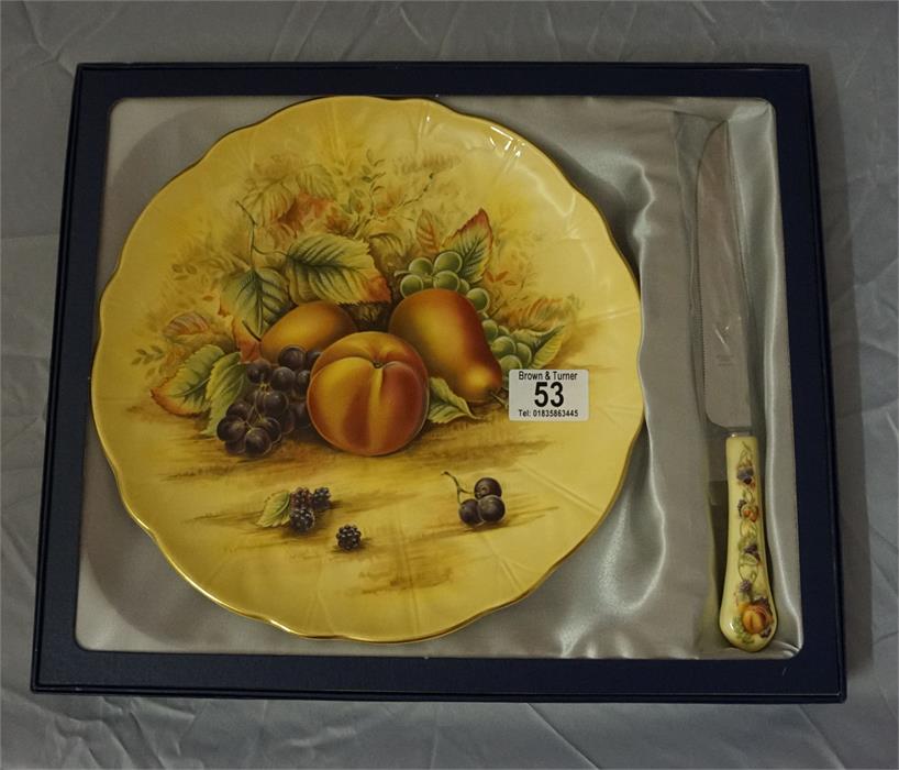 An Ansley 15" diameter fruit decorated plate and matching knife