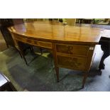 A 19th Century mahogany bow fronted sideboard inlaid with satin wood and ebony