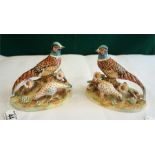 A pair of Crown Staffordshire china ornaments of pheasants modelled by J.T. Jones