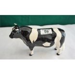 Beswick Friesian Bull, CH. Coddington Hilt Bar, Height 4.75 inches Gloss black and white.